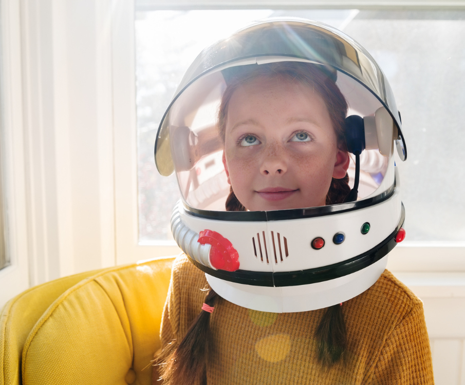 girl with astronaut helmet